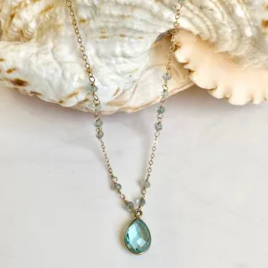Gold necklace with Topaz